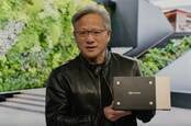 Nvidia CEO Jensen Huang presents the heat sink used by the Grace superchip module at the company's GTC 2023 spring event.